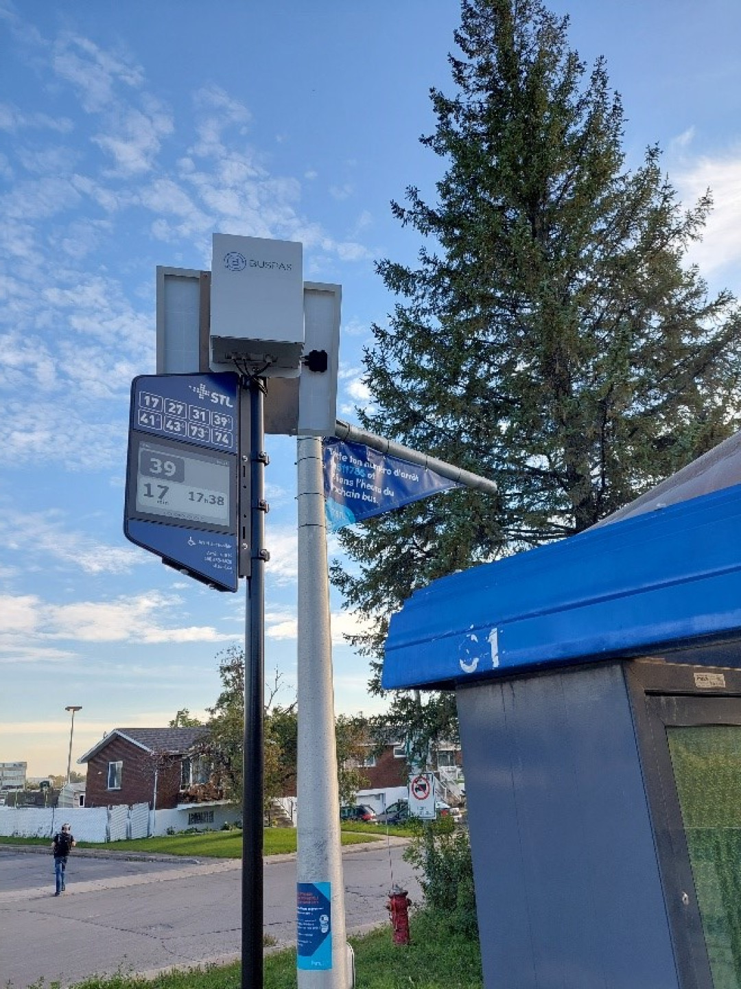 A new digital display prototype at a bus stop.
